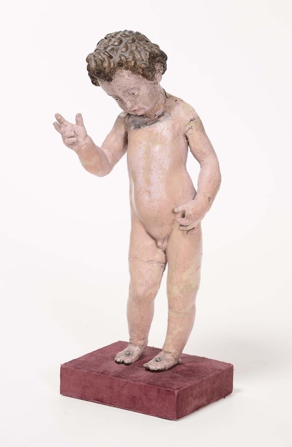 Bambinello antico in bronzo dipinto