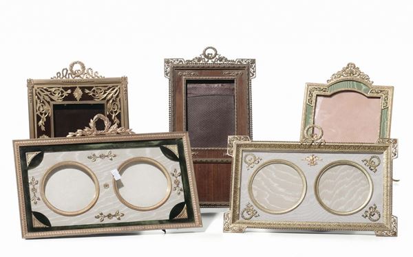 Quattro cornici portafoto in bronzo