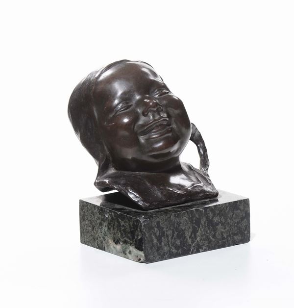 Testina di bimbo in bronzo
