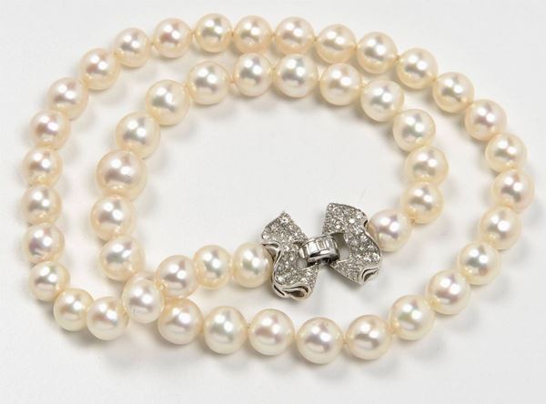 A single-strand of cultured pearl and diamond necklace