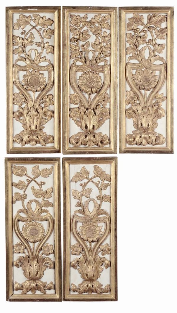 Cinque elementi in legno intagliato e dorato, XIX secolo