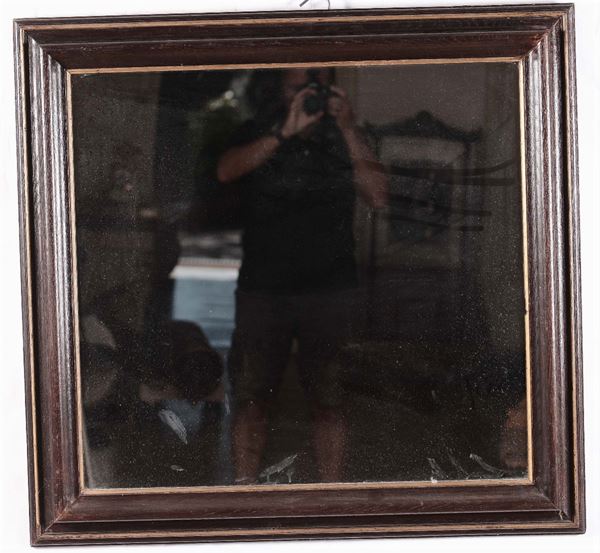 Specchiera in noce con dorature