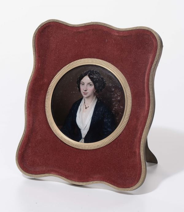 Miniatura circolare con ritratto femminile
