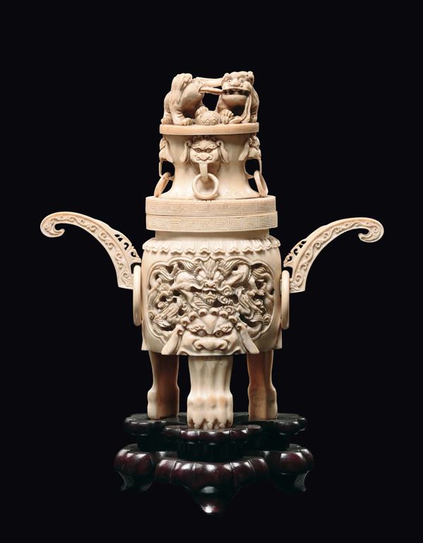 A bone tripod censer with handles, carved with dragons within reserves and cover with Pho dogs, China, Canton, Qing Dynasty, early 19th century