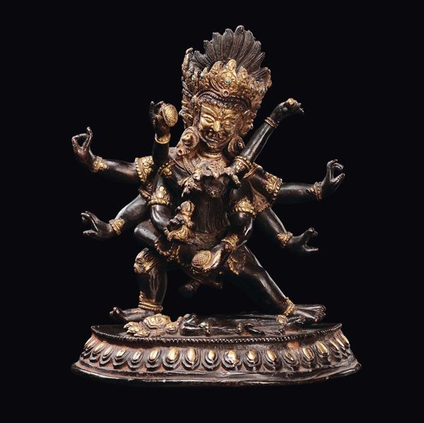 A gilt and glazed bronze figure of Yamantaka, China, Qing Dynasty, 18th century