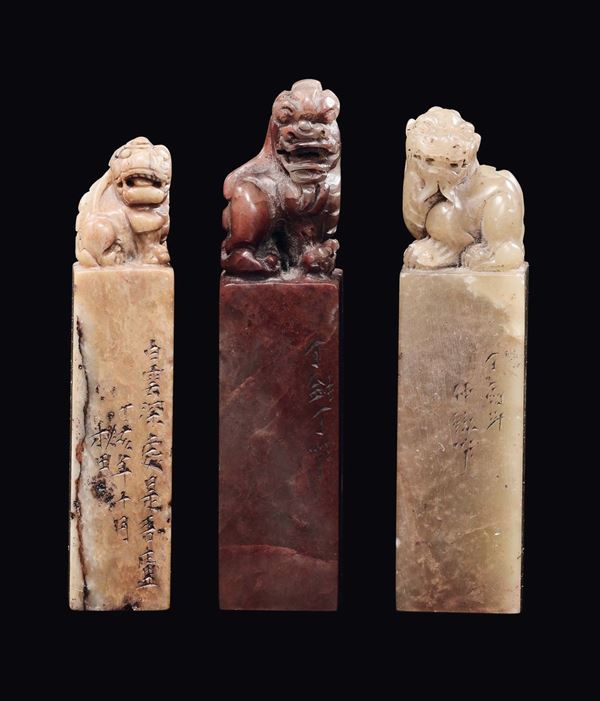 Four soapstone seals with Pho dogs and inscriptions engraved, China, Qing Dynasty, 19th century