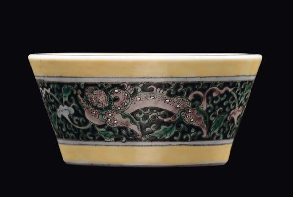 A Famille Noir yellow-ground bowl with floral decoration, China, Qing Dynasty, Guangxu Mark and Period (1875-1908)