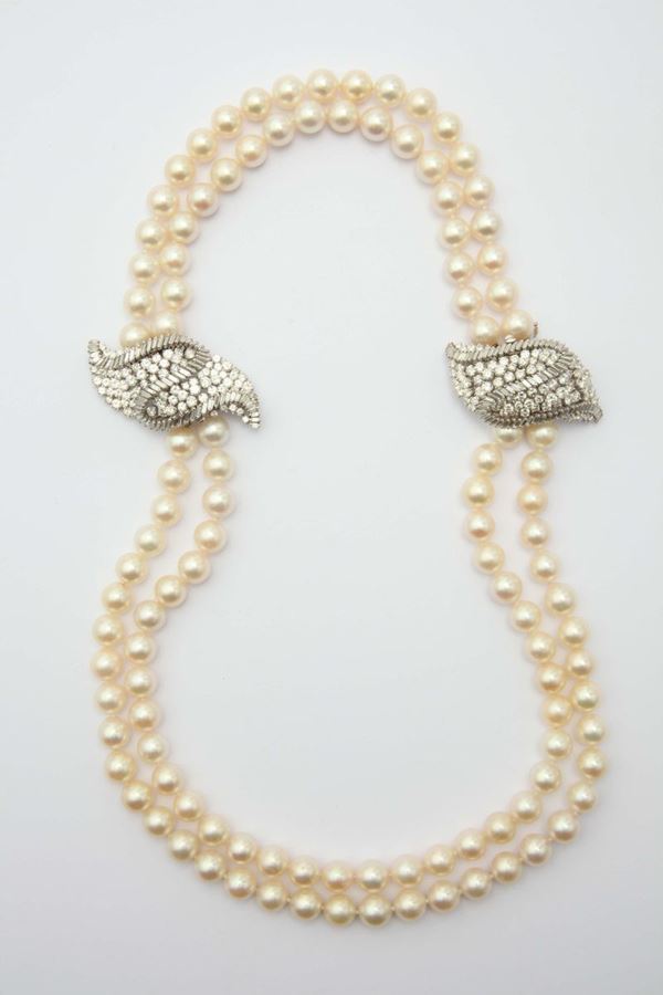 A two-row cultured pearl and diamond necklace/bracelet