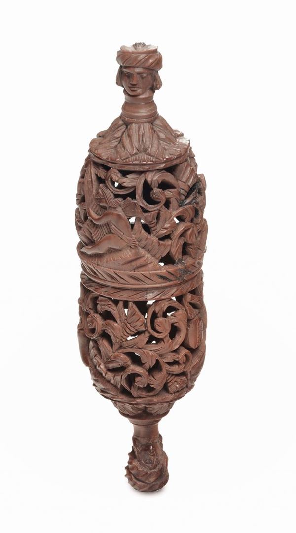 A polished and carved boxwood container with leaves and anthropomorphic motives, probably France 19th century
