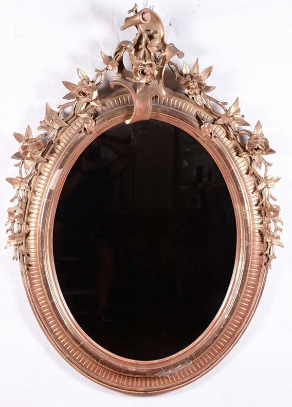 Specchiera ovale in legno dorato, XIX secolo