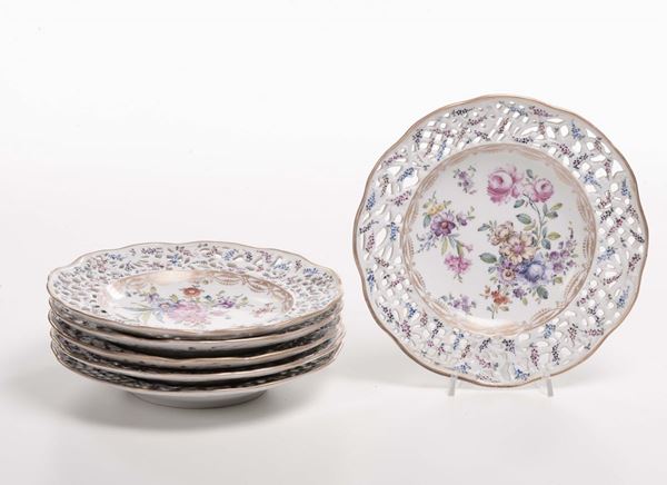 Sei piatti in porcellana policroma e bordo traforato, Meissen XX secolo