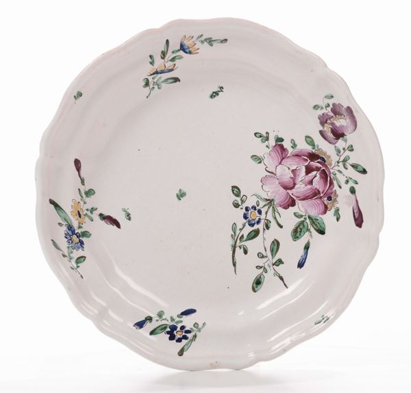 Piatto in maiolica policroma, manifattura Ferretti Lodi