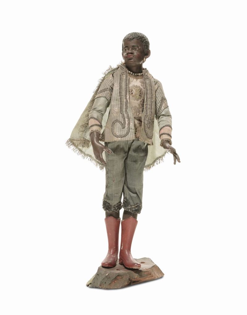Figura di giovane moro poggia muro con stivali rossi, bottega di Pasquale Navone (1746-1791), manifattura genovese  - Asta Sculture del Presepe Napoletano e Genovese - I - Cambi Casa d'Aste