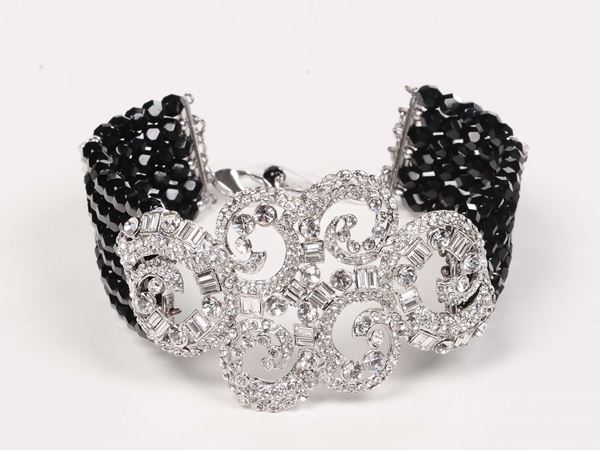 Carlo Zini spilla nera a disegno floreale