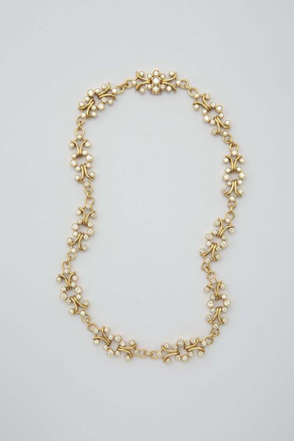 a diamond and gold necklace, by Enrico Cirio Italy