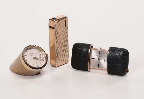 Lotto composto da due orologi ed un accendino