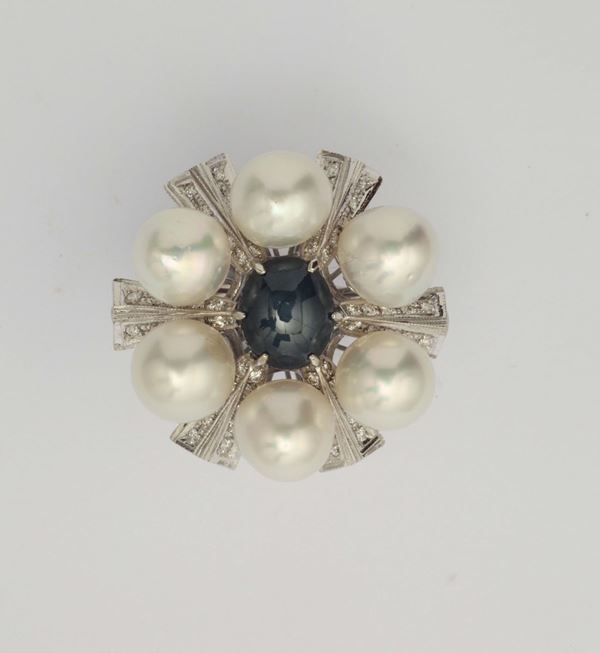A sapphire, cultured pearl and diamond ring
