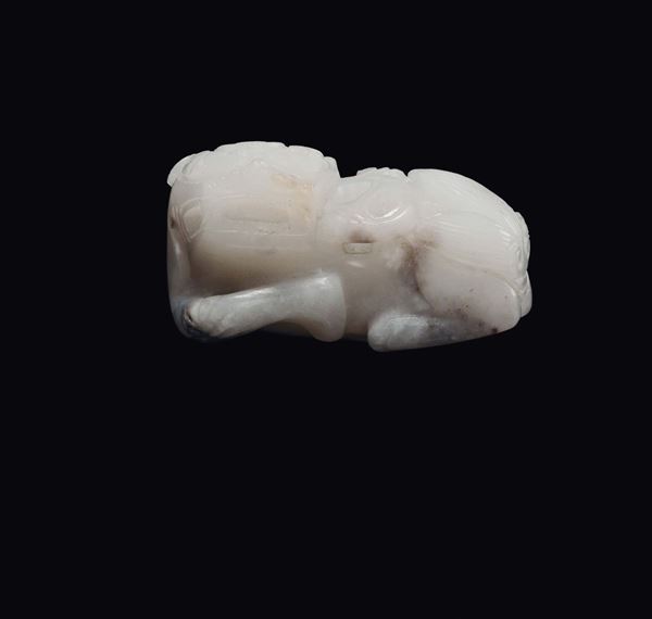 A white jade and russet Pho dog with ruyi on his back, China, Qing Dynasty, 19th century