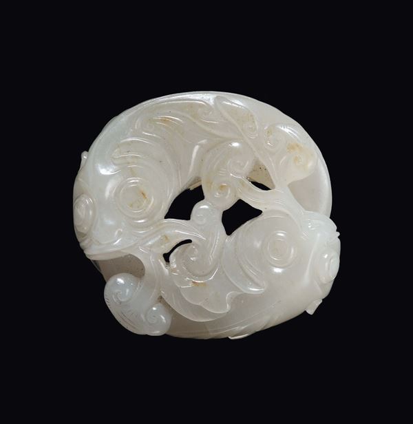 A white jade circular fish group, China, Qing Dynasty, 19th century
