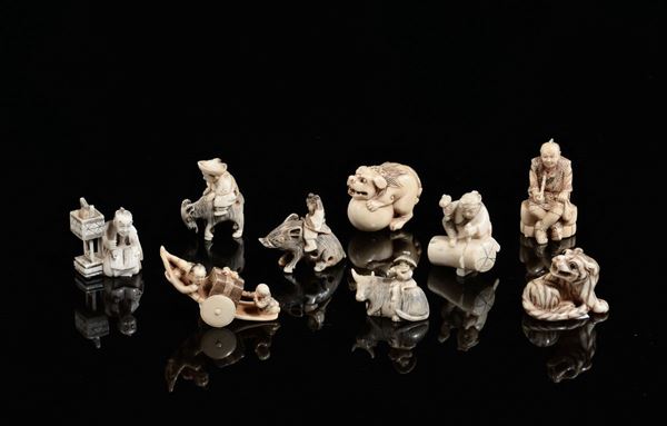 Lot of nine netsuke with common life scenes and fantastic animal, Japan, early 20th century