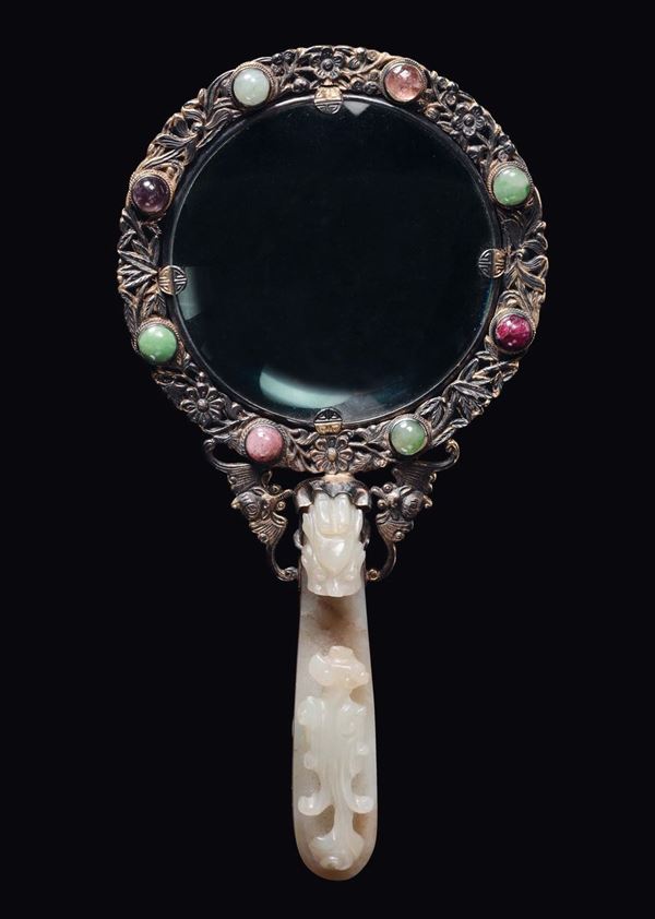 A magnifying glass with white jade dragon handle and emiprecious stones insert, China, Qing Dynasty, 19th century