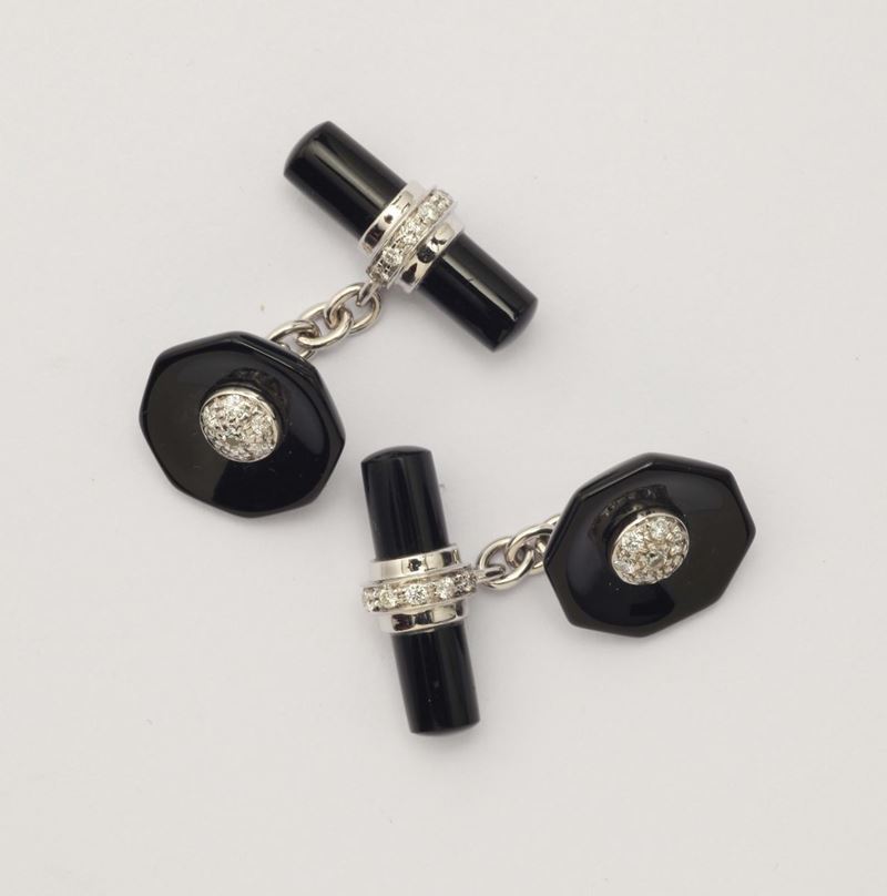 An onix and gold cufflinks  - Auction Fine Jewels - I - Cambi Casa d'Aste