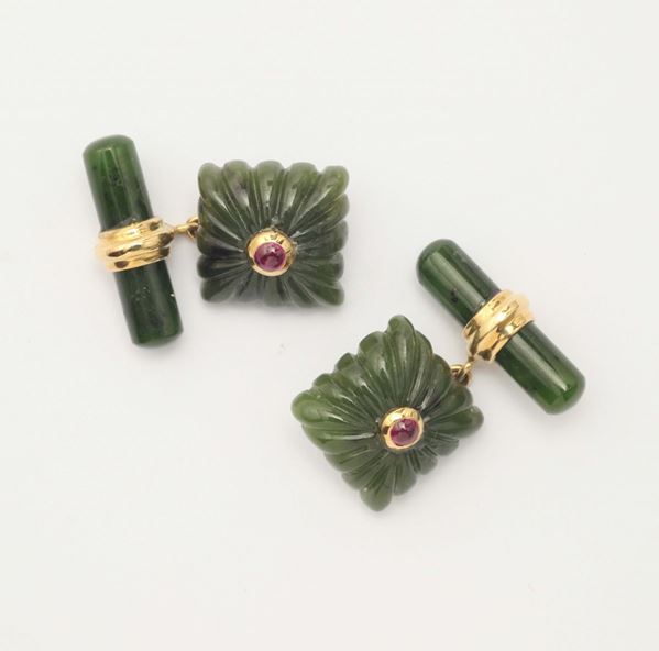 A pair of nephrite and ruby cufflinks