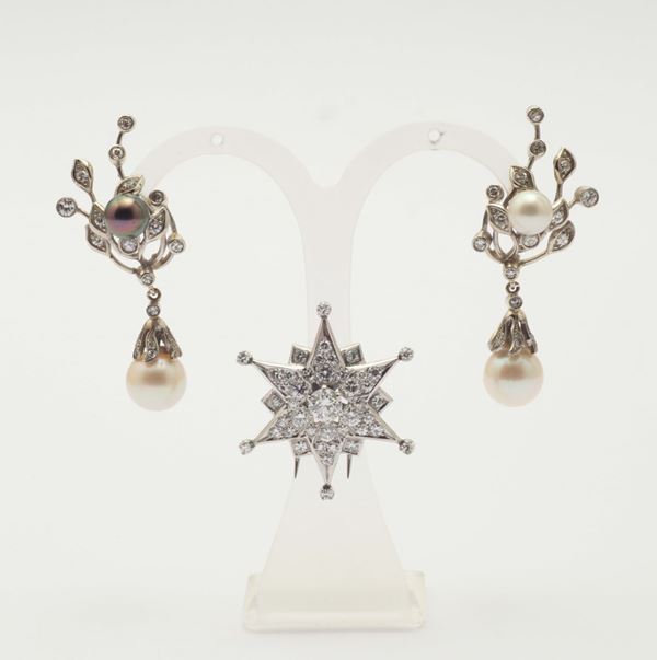A lot of a pair of diamond and pearl pendant earrings and two diamond and torumaline brooch