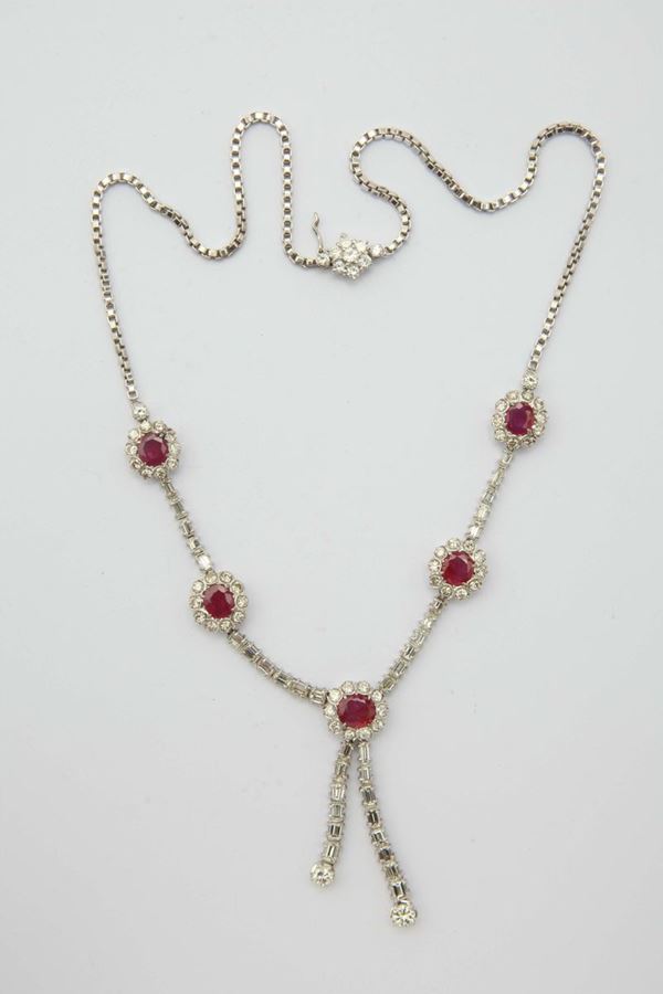 A ruby and diamond gold necklace. Signed Boucheron Paris on the clasp