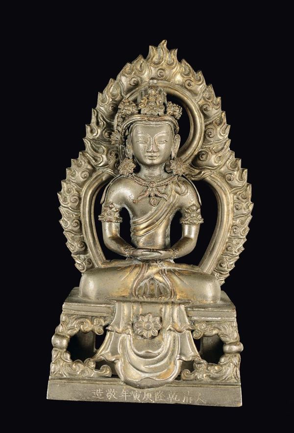 A gilt bronze Amitaya with aura, China, Qing Dynasty, Qianlong Mark and Period (1736-1795)