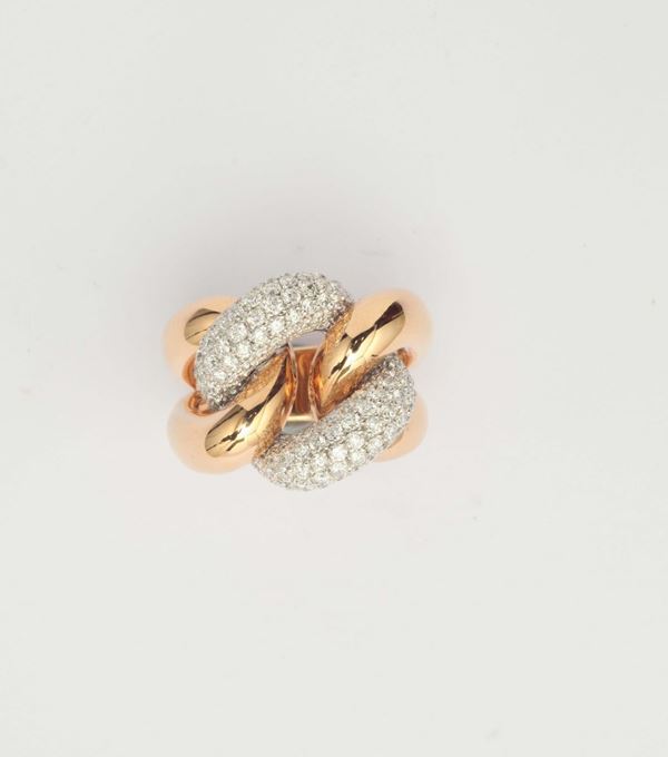 A gold and diamond ring. By Brarda