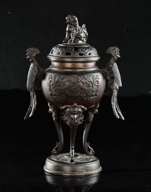 A bronze censer and cover with Pho dog and phoenicians handles, China, Qing Dynasty, 19th century