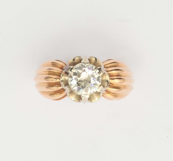A diamond and gold ring