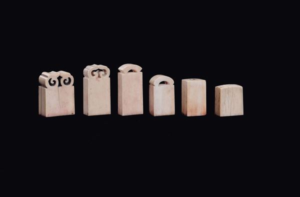 Six small rectangular ivory seals with case, China, Qing Dynasty, 19th century