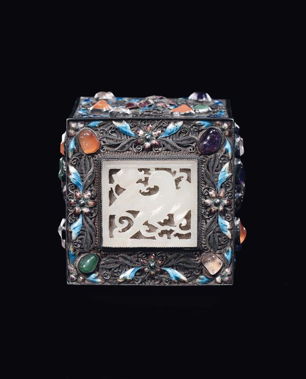 A silver and cloisonné glazed box and cover with a white jade fretworked phoenix plaque, China, Qing Dynasty, 19th century