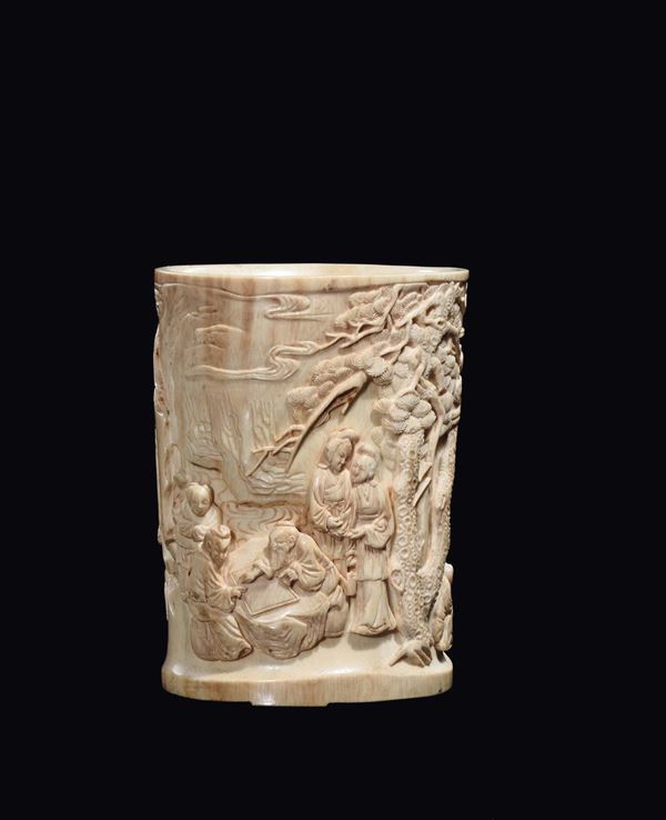A carved bone brushpot with common life scenes, China, Qing Dynasty, 19th century