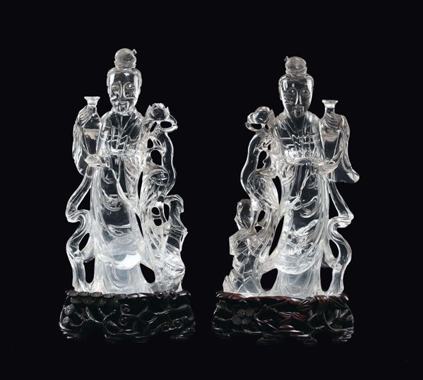 A pair of rock crystal Guanyin with vase and rose, China, Qing Dynasty, 19th century