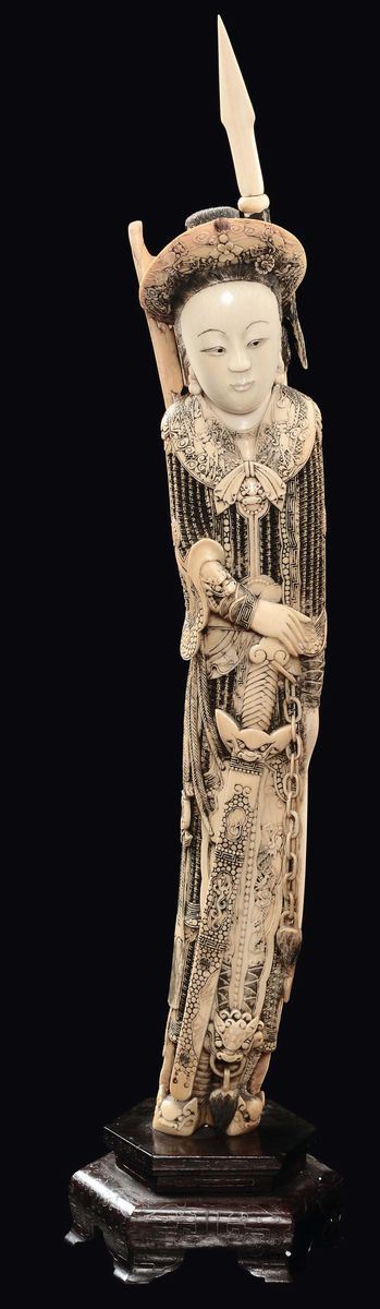 A carved ivory warrior with spear, chain, bow, arrows and sword, China, Qing Dynasty, 19th century
