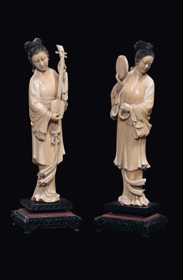 A pair of ivory playing Guanyin, China, early 20th century