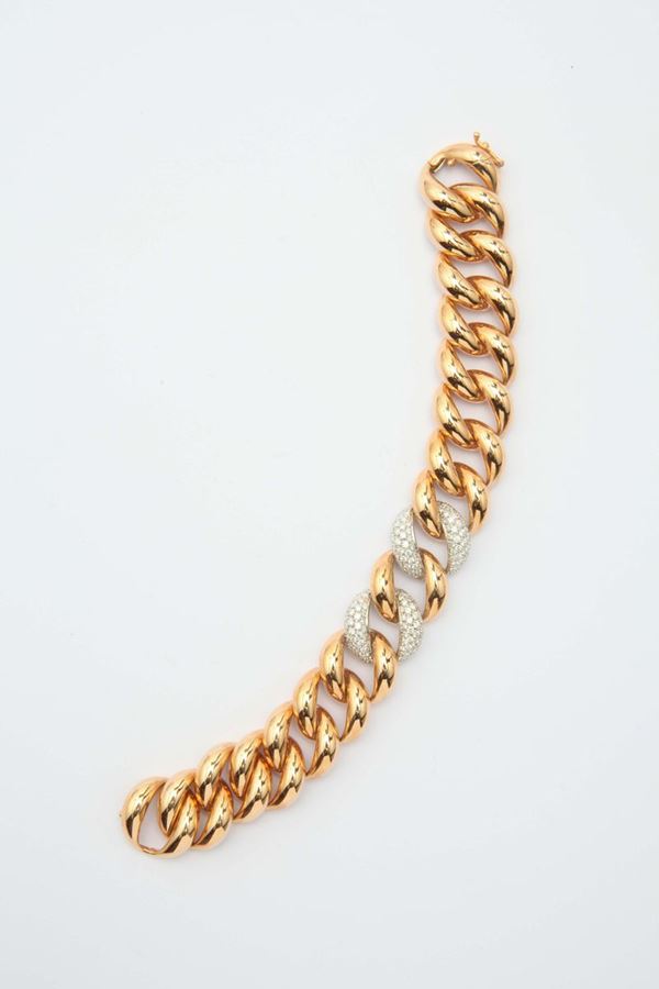 A gold and diamond bracelet. By Brarda