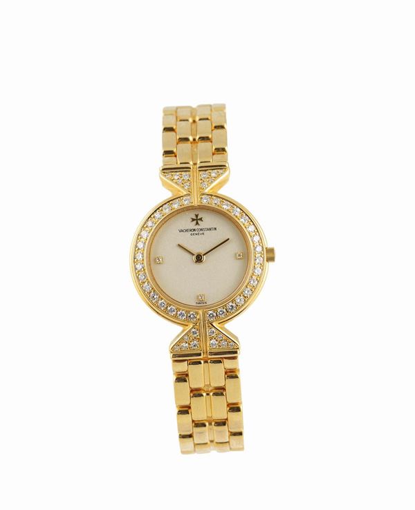 VACHERON CONSTANTIN, orologio da signora, al quarzo, in oro giallo 18K e brillanti, con bracciale in oro giallo 18K.