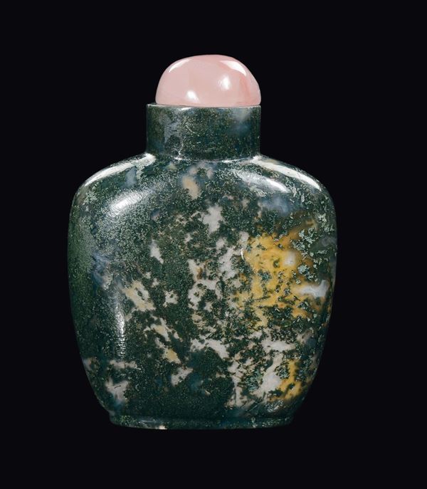 A green jade and russet snuff bottle with pink stopper, China, Qing Dynasty, 19th century