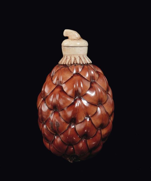 A glazed ivory pine cone snuff bottle, China, Qing Dynasty, 19th century