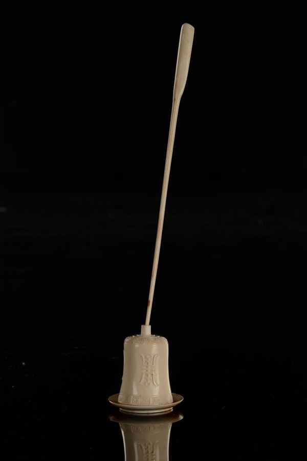 An ivory small funnel and dish snuff bottle filler, China, Qing Dynasty, 19th century