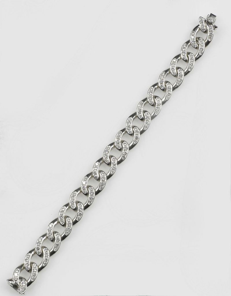 A diamond and gold bracelet. The diamonds weighing approx. 4,50 carats are mounted in yellow rhodium gold 750/1000  - Auction Fine Jewels - Cambi Casa d'Aste