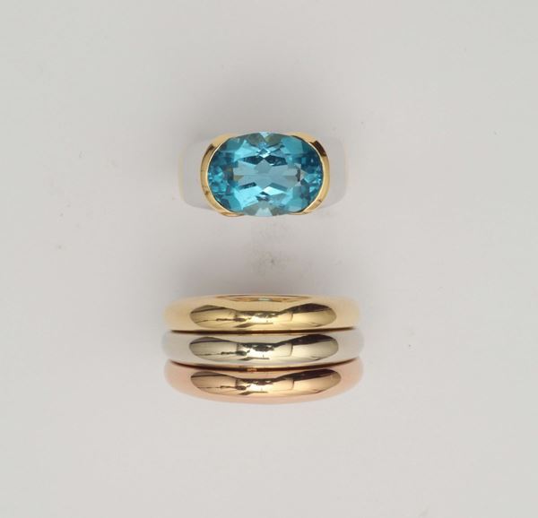 Cartier and Marina B. A lot of two gold and topaz rings
