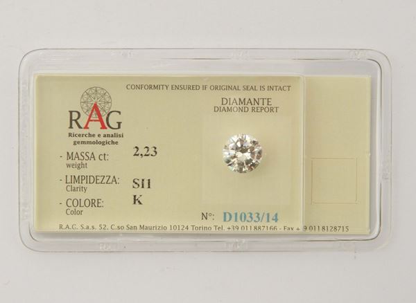 An unmounted diamond ct 2,23; color K; clarity SI1. Report R.A.G. Torino