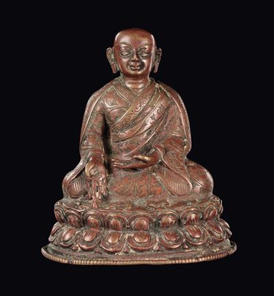 Figura di Lama in rame su doppio fiore di loto, Tibet, XVII secolo