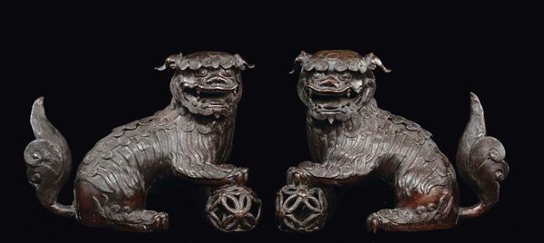 A pair of bronze Pho dogs and balls, China, Qing Dynasty, Qianlong period (1736-1795)