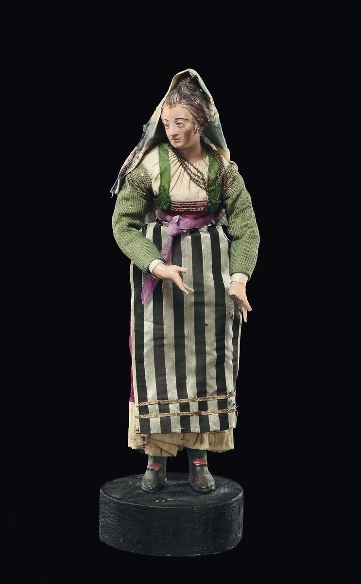 Donna con veste verde e grembiule a righe, Napoli XVIII-XIX secolo  - Asta Sculture del Presepe Napoletano e Genovese - I - Cambi Casa d'Aste